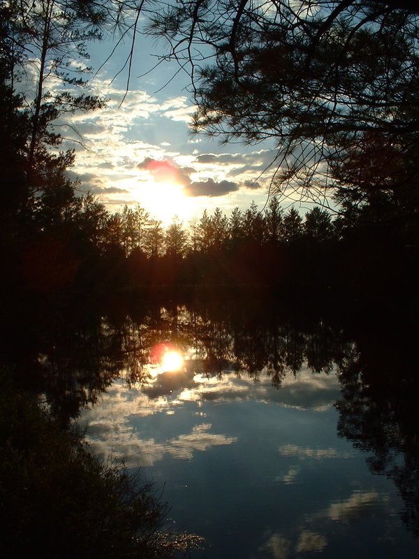 Another photograph of a sunset over a body of water