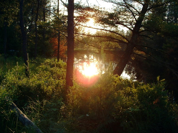 Another photograph of a sunset over a body of water