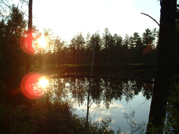 Yet another photograph of a sunset over a body of water